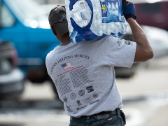 Flint Michigan-Volunteer GoingDoor To Door With Water.
Image by Foster Garvin
