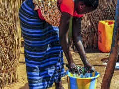 Mother and Child Wash Day  - Image by Isadore Howard